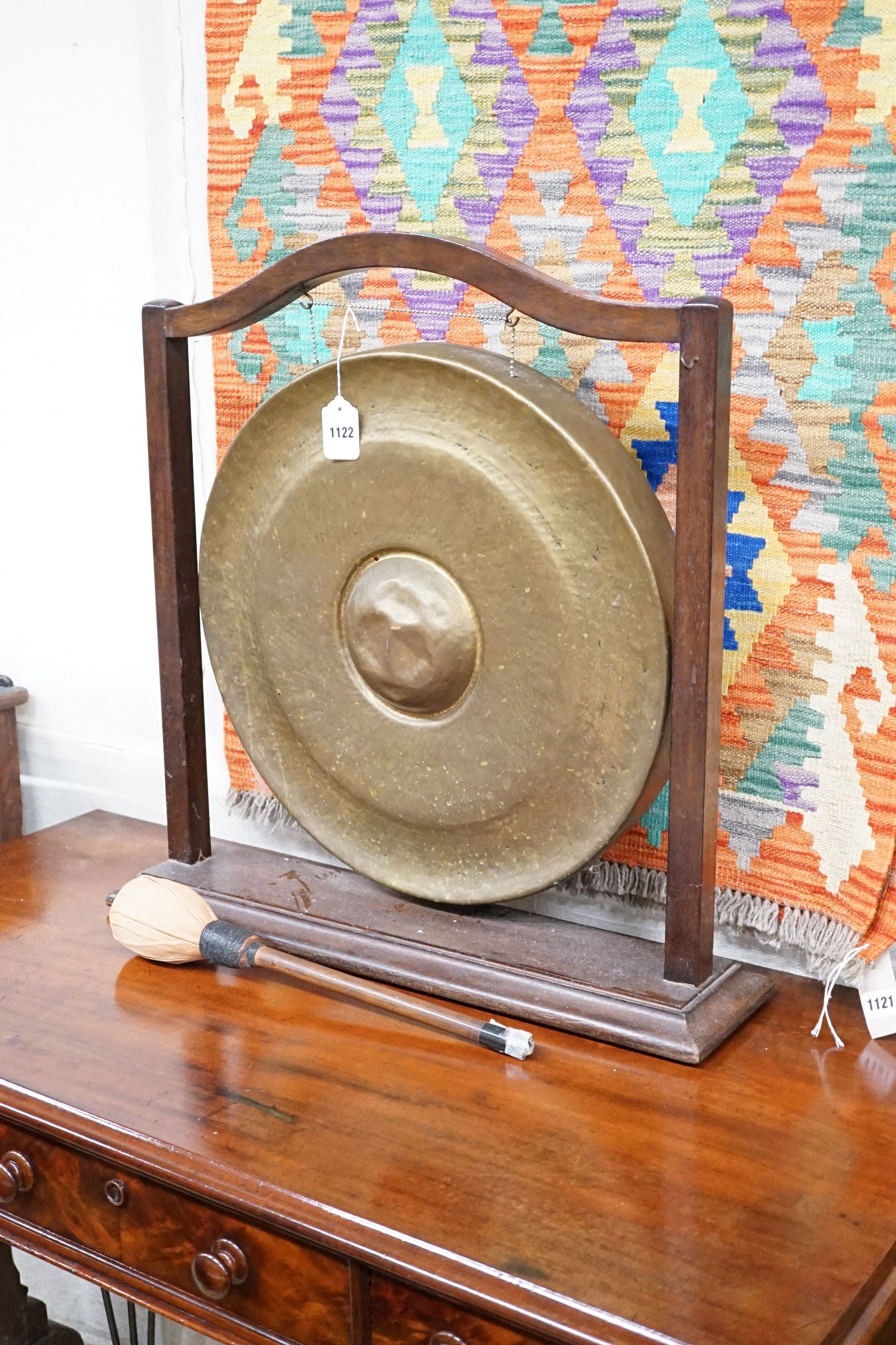 An Edwardian hardwood framed brass gong with striker, width 67cm, height 66cm